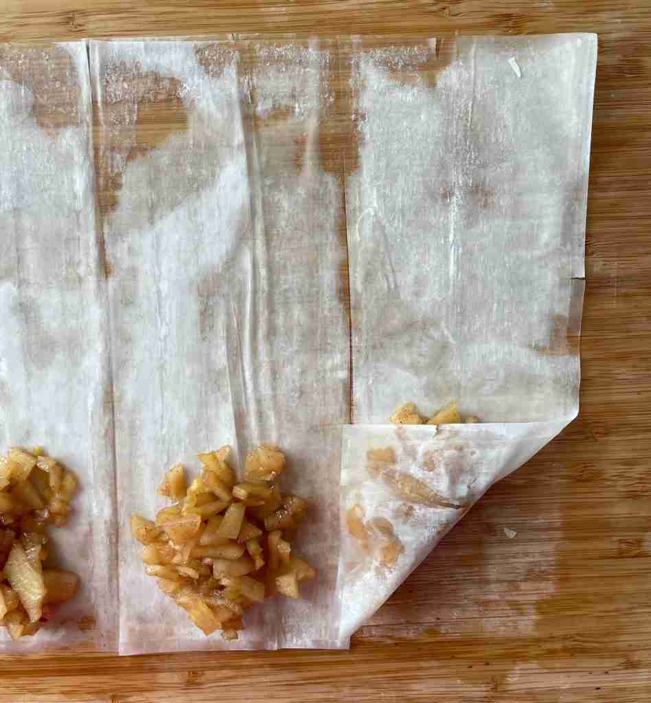 Step two to fold phyllo dough apple turnovers.