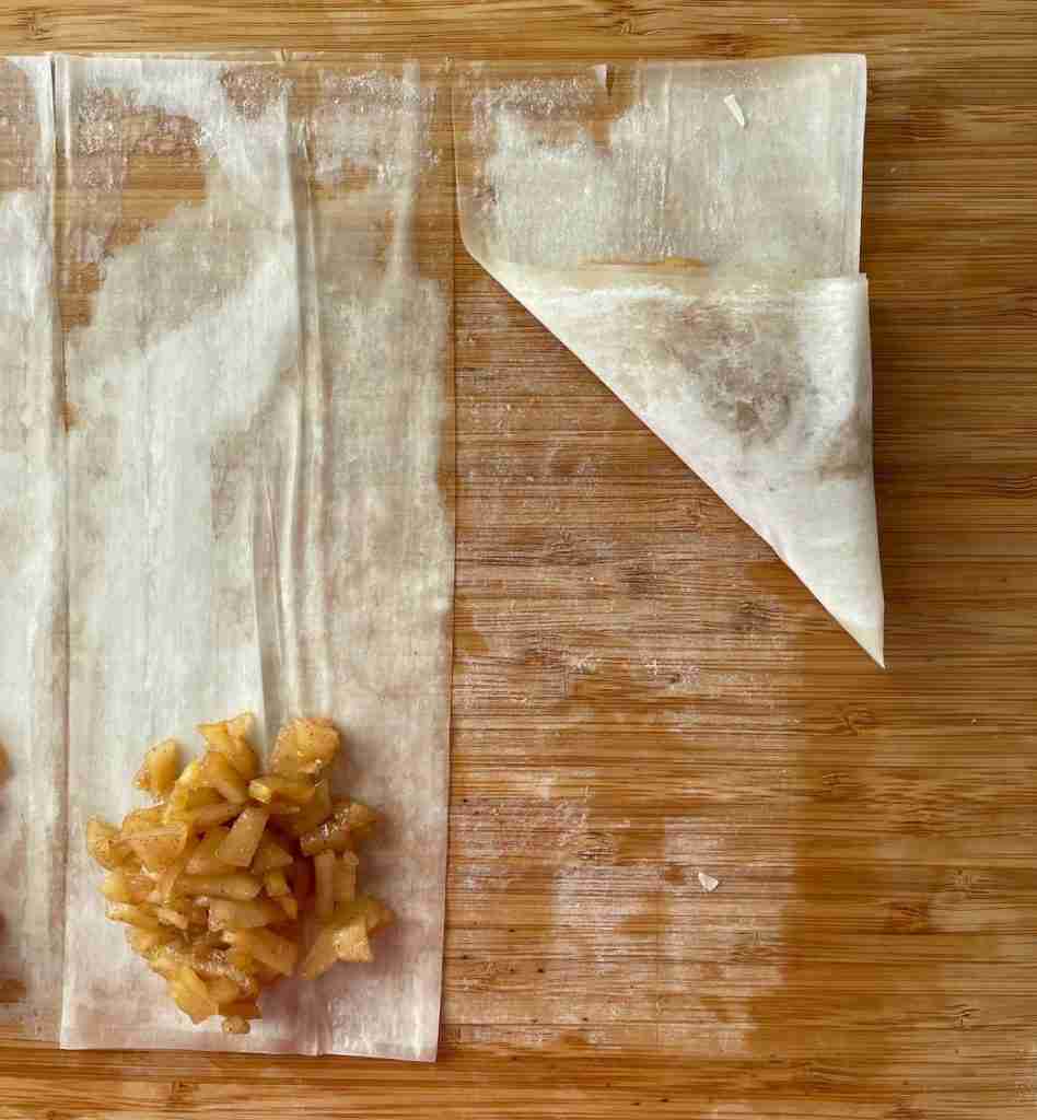 Step four to fold phyllo dough apple turnovers.