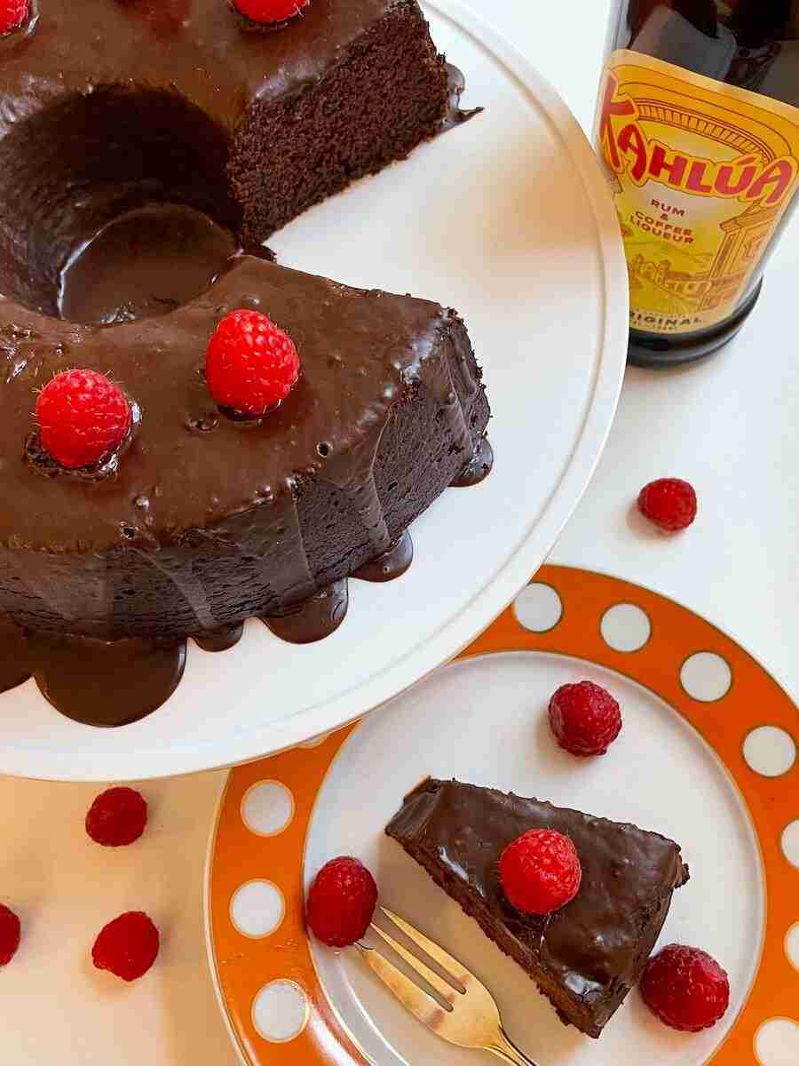 Kahlua Chocolate Cake with a dark chocolate glaze and raspberries