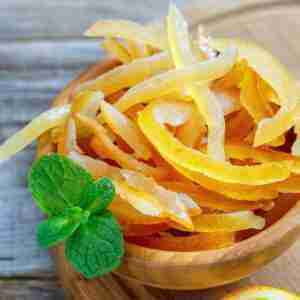 Candied lemon and orange Citrus Peels in a bowl.