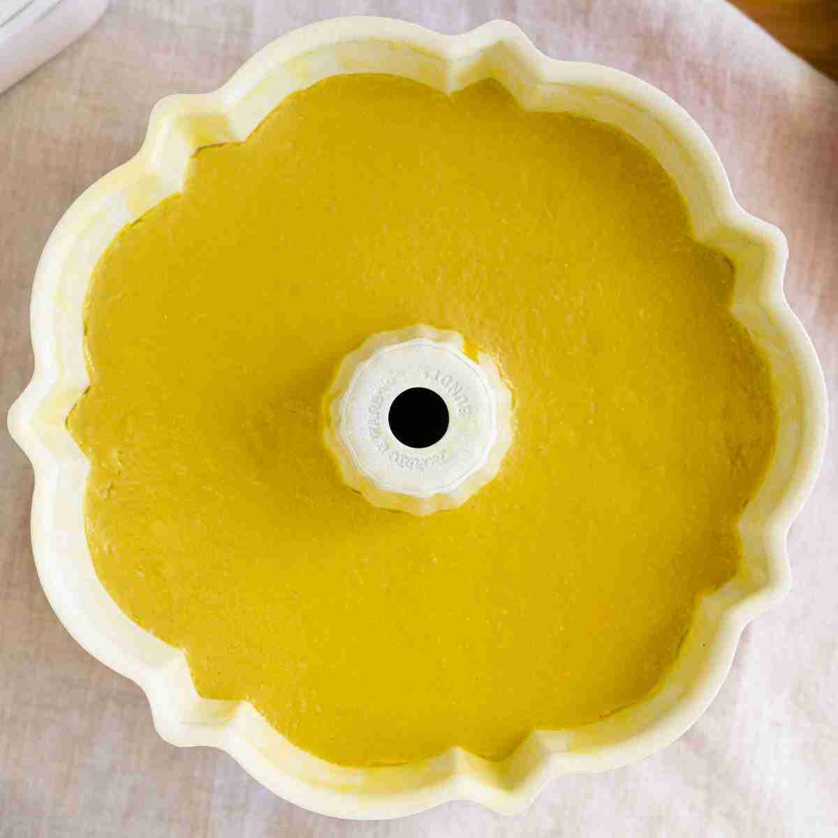 Milk jello cake in a NordicWare cake pan.