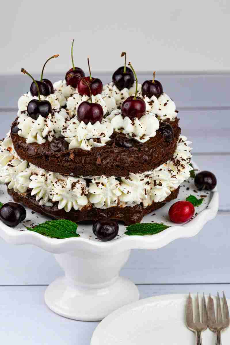 This healthier Keto Black Forest Cake is made with almond flour, avocado and a mouthwatering chocolate-cherry brandy sauce.