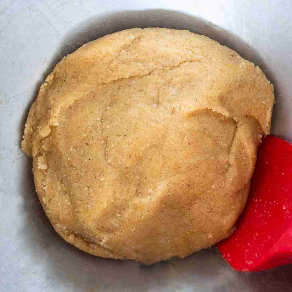 Step 4 in the low carb stollen recipe: Shaping the almond flour Stollen dough into a dough ball.