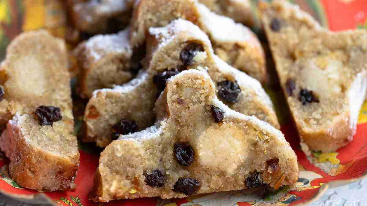 Slices of low carb, gluten free Stollen filled with marzipan and candied citrus peels.