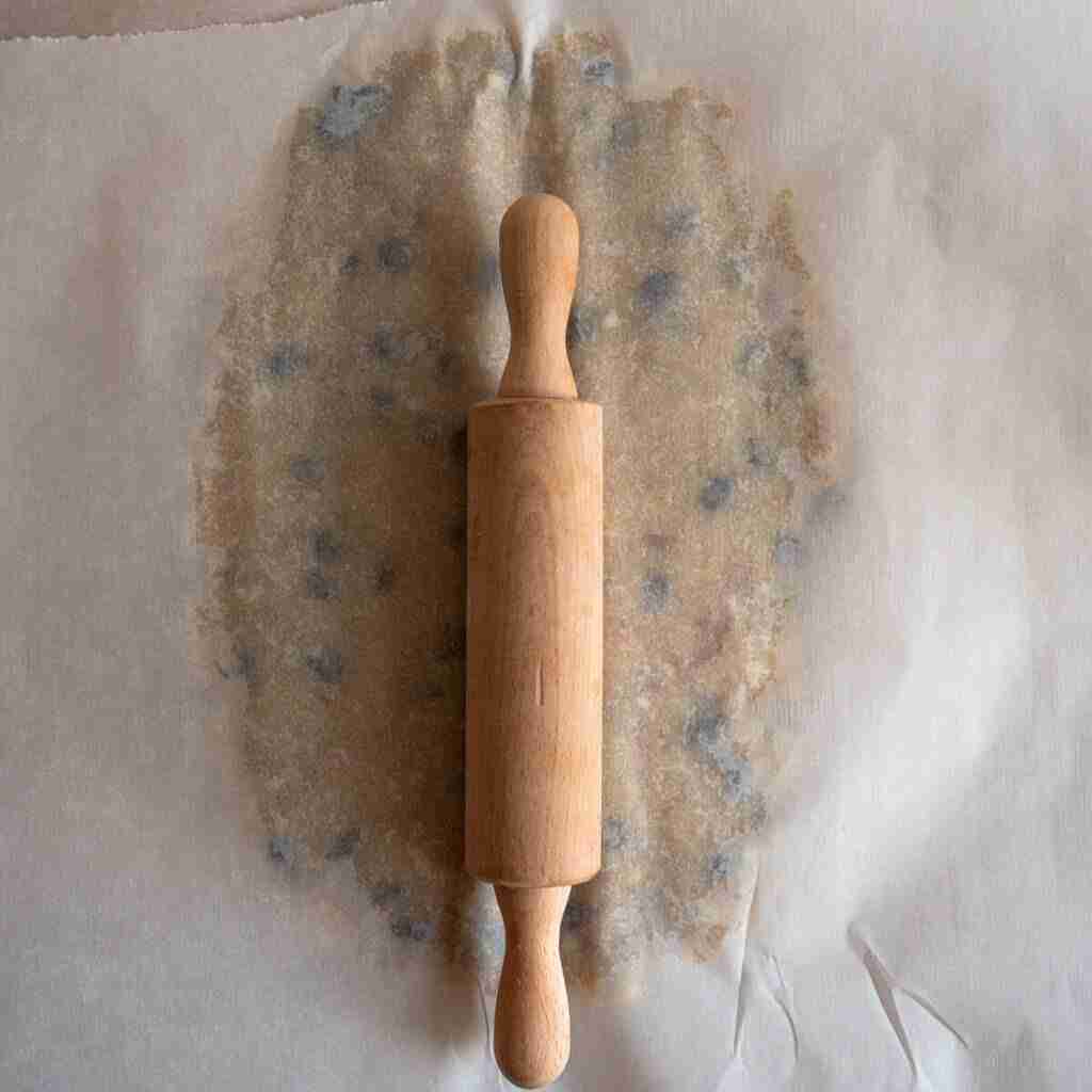 A step in the recipe: Rolling out the dough and making an indentation to insert the Stollen marzipan.