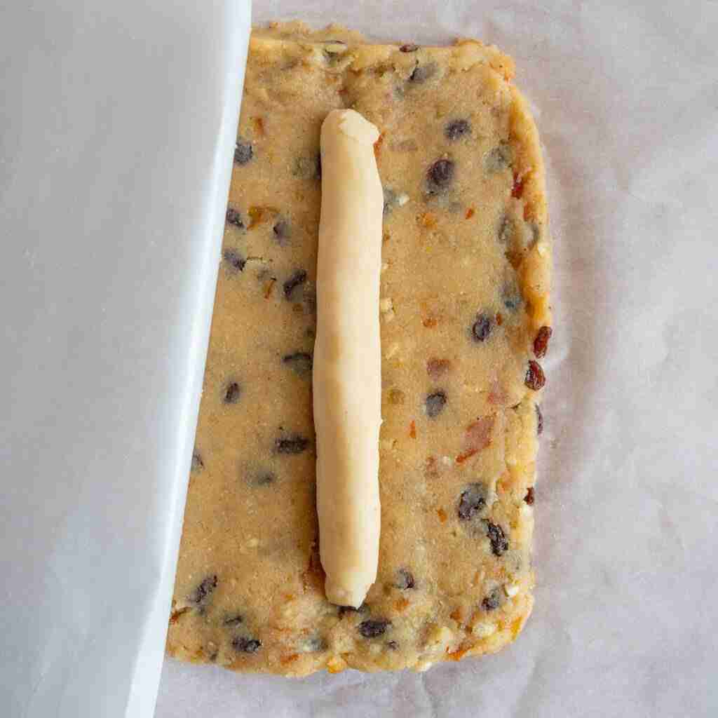 A step in the recipe: Inserting the homemade Stollen marzipan.