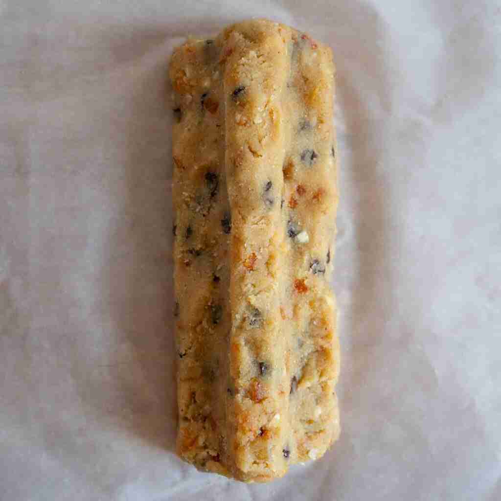 A step in the recipe: Shaping the German fruit cake and giving the Christstollen its hump.