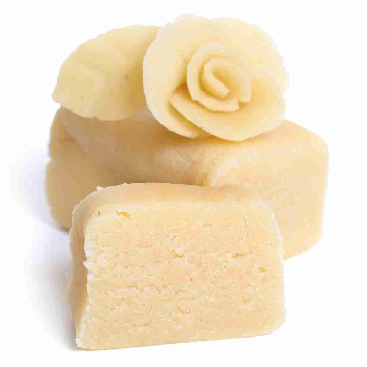 A sugar free Keto Marzipan loaf topped with a marzipan rose.