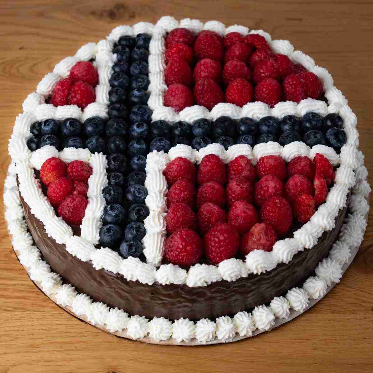 A Norwegian flag cake: This dessert is styled with blueberries, raspberries and whipped cream in the shape of the Norwegian Flag.