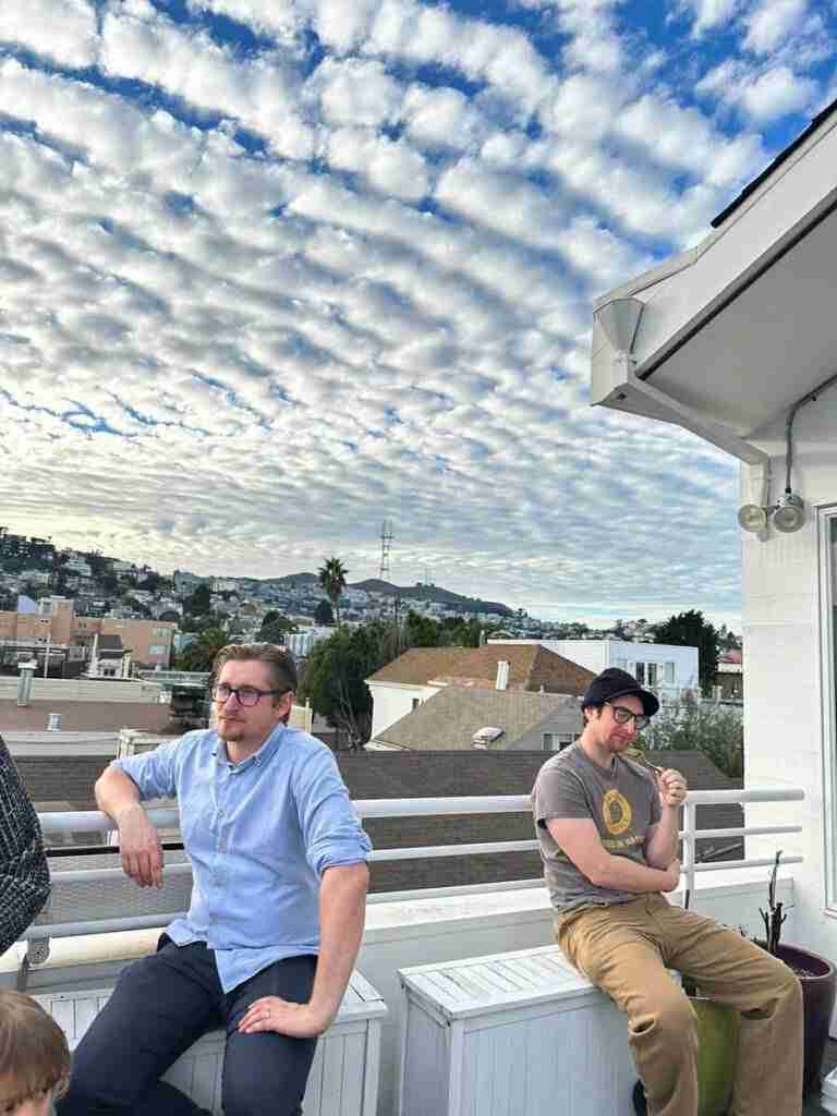 The deep blue sky and stunning clouds on the deck at the dessert party in Noe Valley, San Francisco.