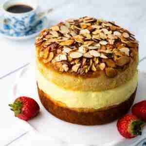 This gluten free bee sting cake recipe yields a keto bee sting cake filled with sugar free vanilla pudding and topped with a honey-almond glaze.