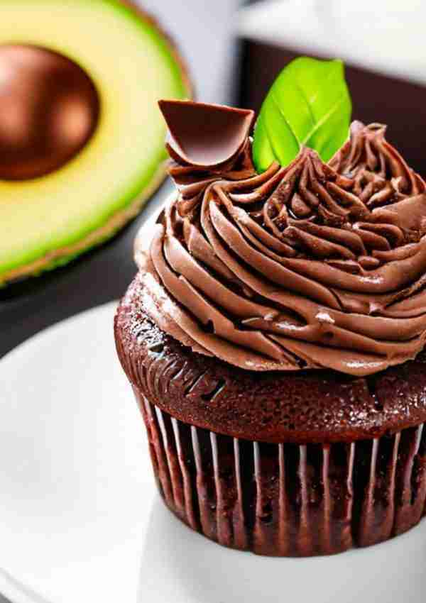 A muffin piped with chocolate avocado frosting.