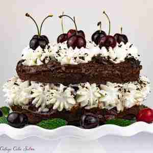 Keto black forest cake made with almond flour, dark chocolate and cherry brandy.