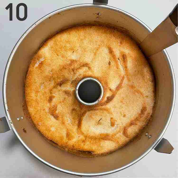 A step in the recipe: Cut the orange angel food cake out of the pan.