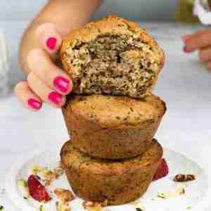 Three healthy protein zucchini muffins with walnuts.