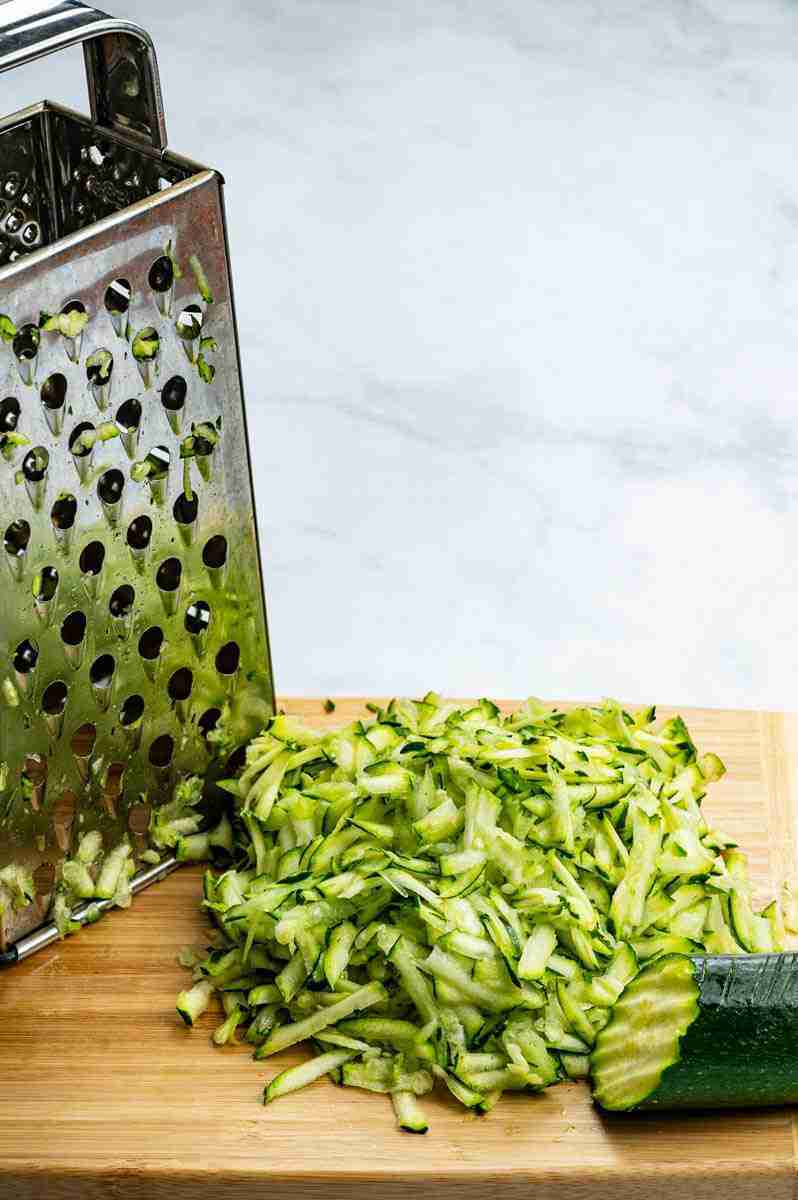 A step in the recipe where the veggie is shredded on the box grater.