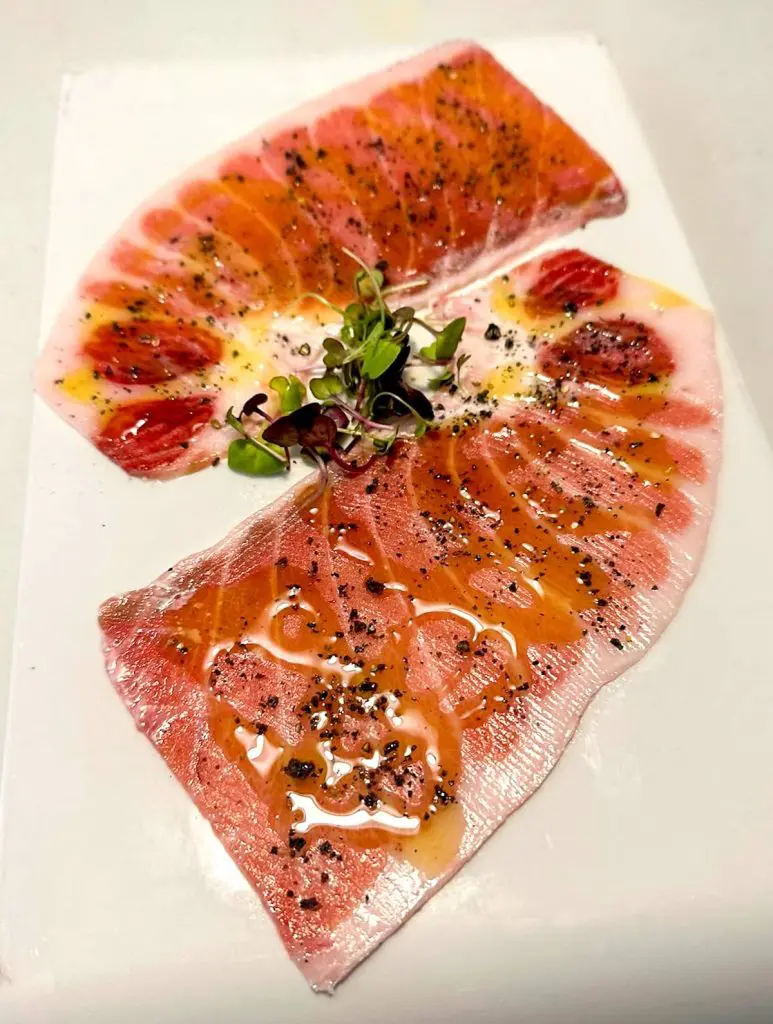 Red tuna carpaccio at Agua Salada Restaurant, Cabanyal, Valencia, Spain.