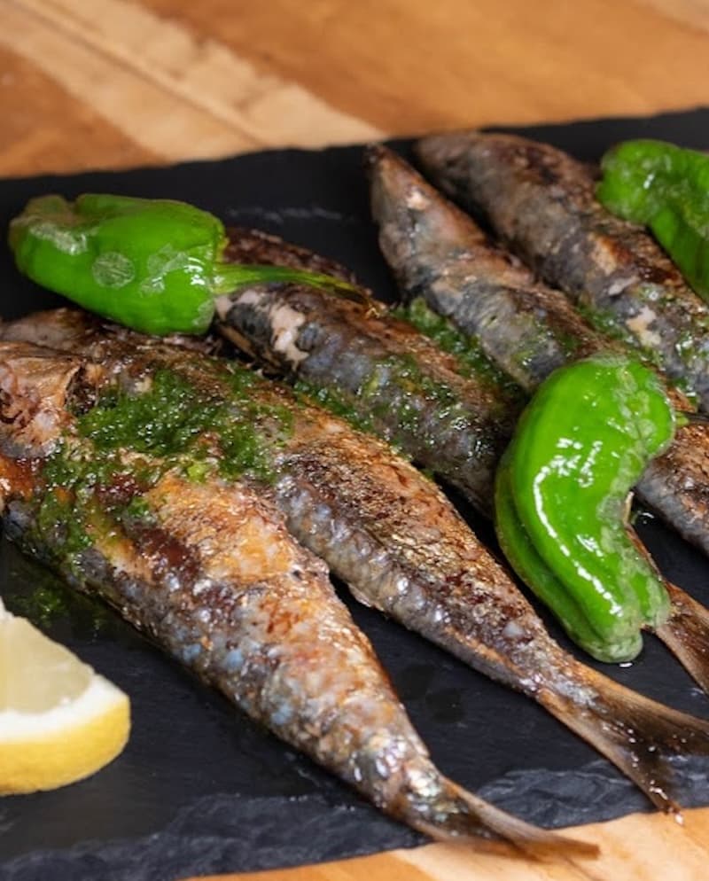 Grilled sardines at La Batisfera Restaurant and Cafe in the Cabanyal, Valencia, Spain.