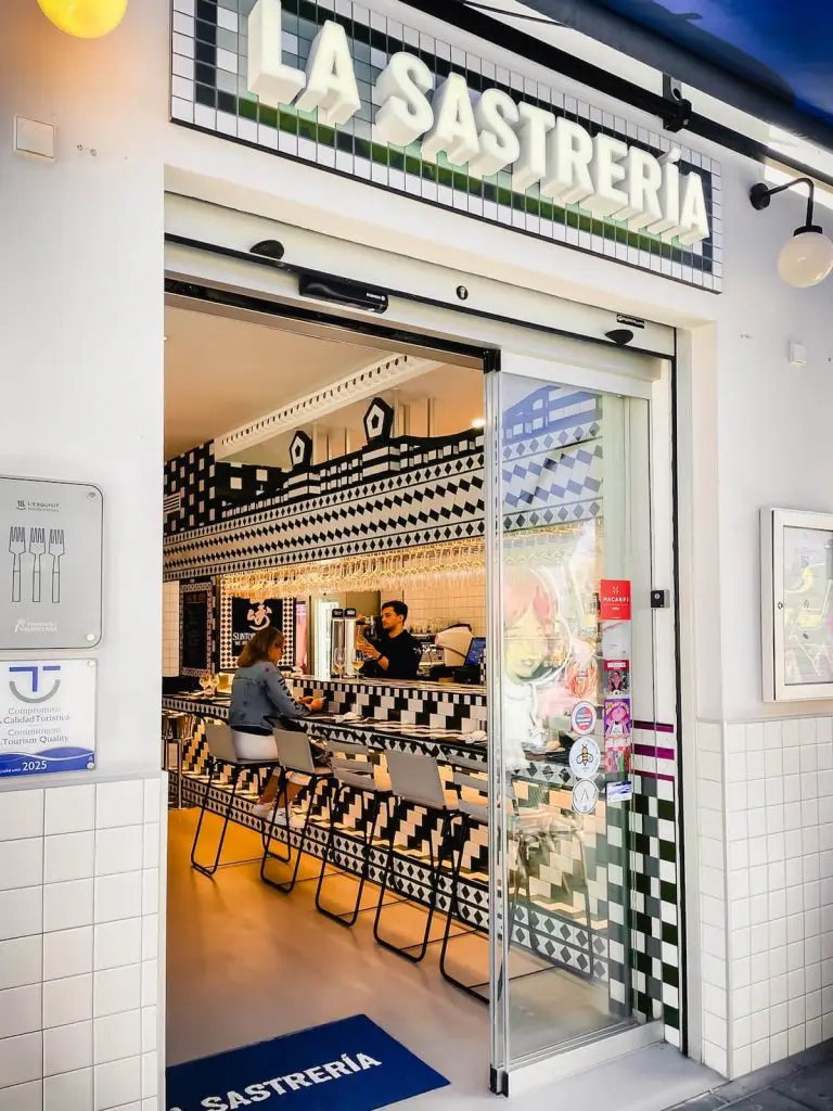 The door opening to the inside bar of La Sastrería seafood restaurant in the Cabanyal hood of Valencia, Spain.