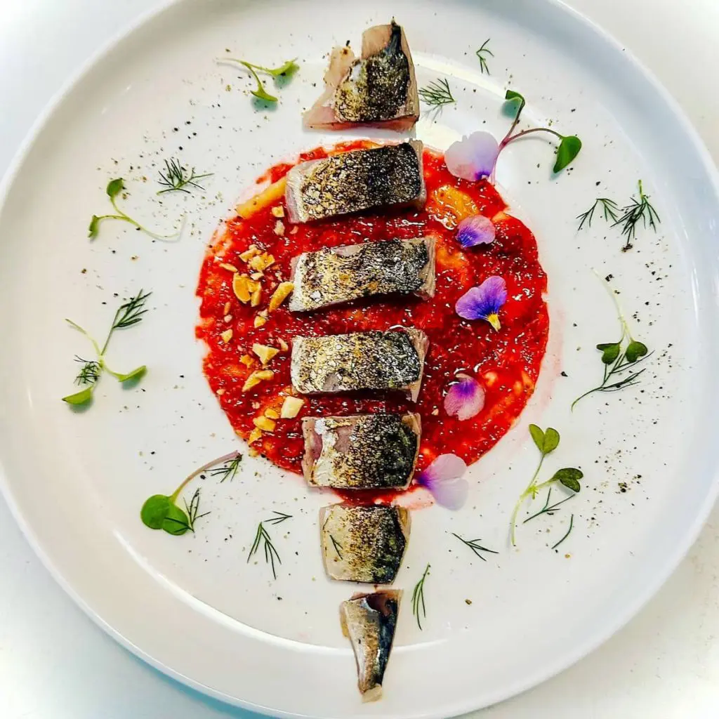 Mackerel on fig carpaccio at Agua Salada Restaurant in El Cabanyal-El Canyamelar, Valencia, Spain.