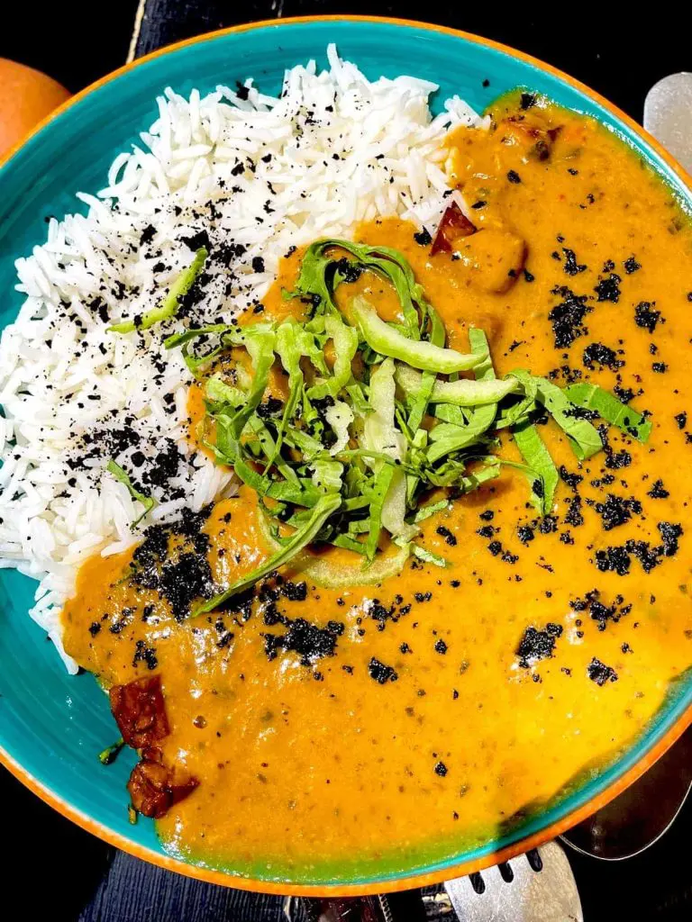 Massaman Vegan Curry with Rice at Mestiza plant-based restaurant in the Cabanyal, Valencia.