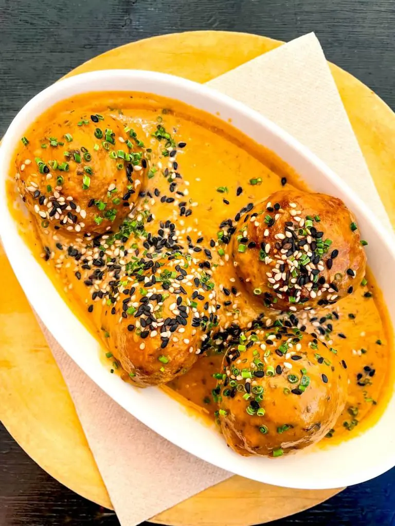 Plant based meatballs in Thai sauce at Mestiza plant-based Cabanyal restaurant, Valencia, Spain.