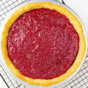 Putting sugar free cherry pie filling in a low carb almond flour pie crust results in this stunning healthy cherry pie or tart.