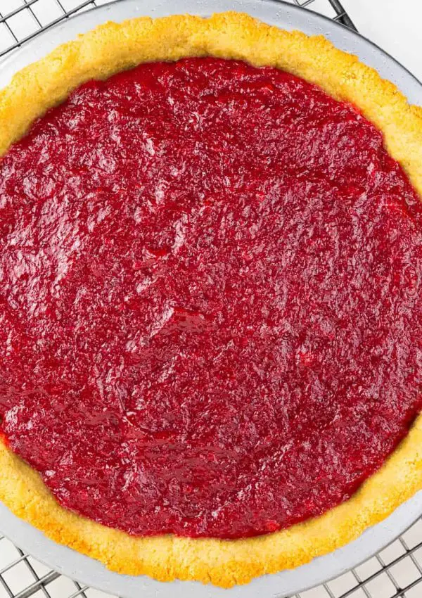 Putting sugar free cherry pie filling in a low carb almond flour pie crust results in this stunning healthy cherry pie or tart.