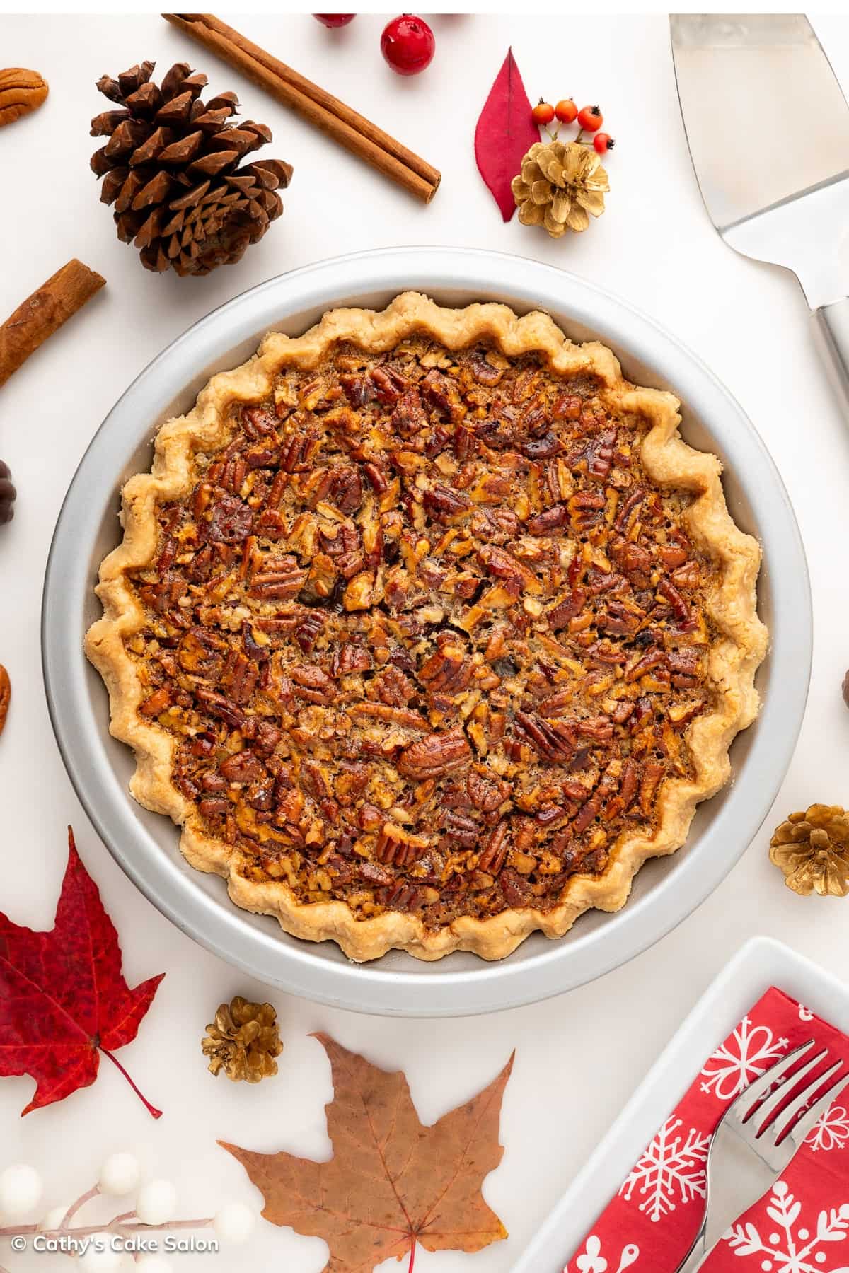A baked gluten free pecan pie made with karo corn syrup and no refined sugar.