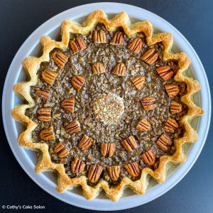 A keto, low-carb, almond flour pie crust with a baked, sugar free pecan pie filling in it.
