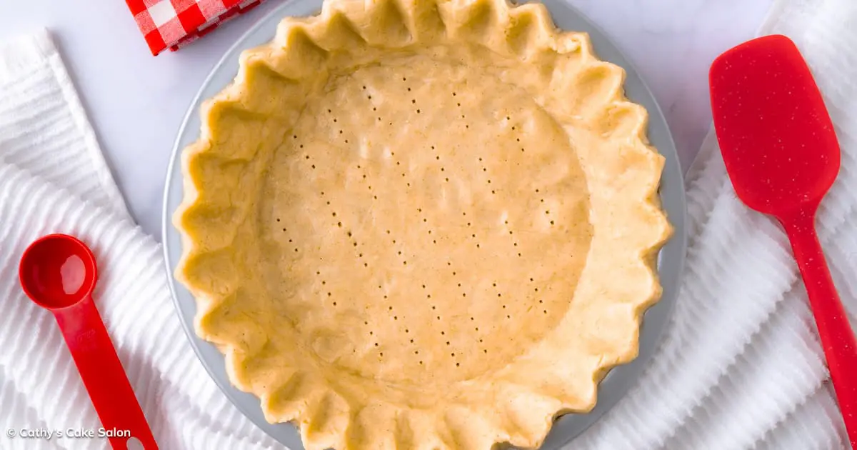 The unbaked, docked and fluted crust from this vegan gluten free pie crust recipe.