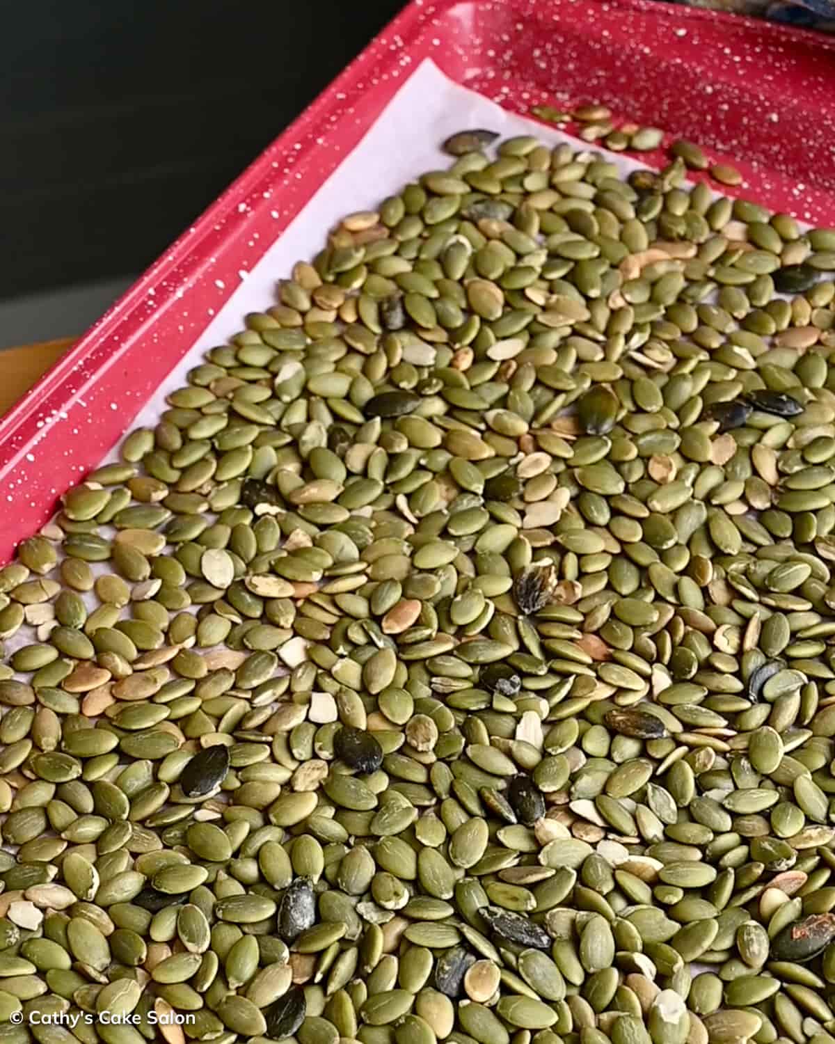 A step in the recipe: the roasted pumpkin seeds.
