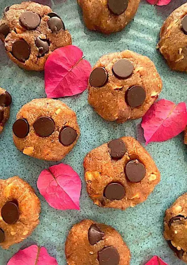 No Bake Almond Flour Cookies with sugar free chocolate chips on a blue plate.