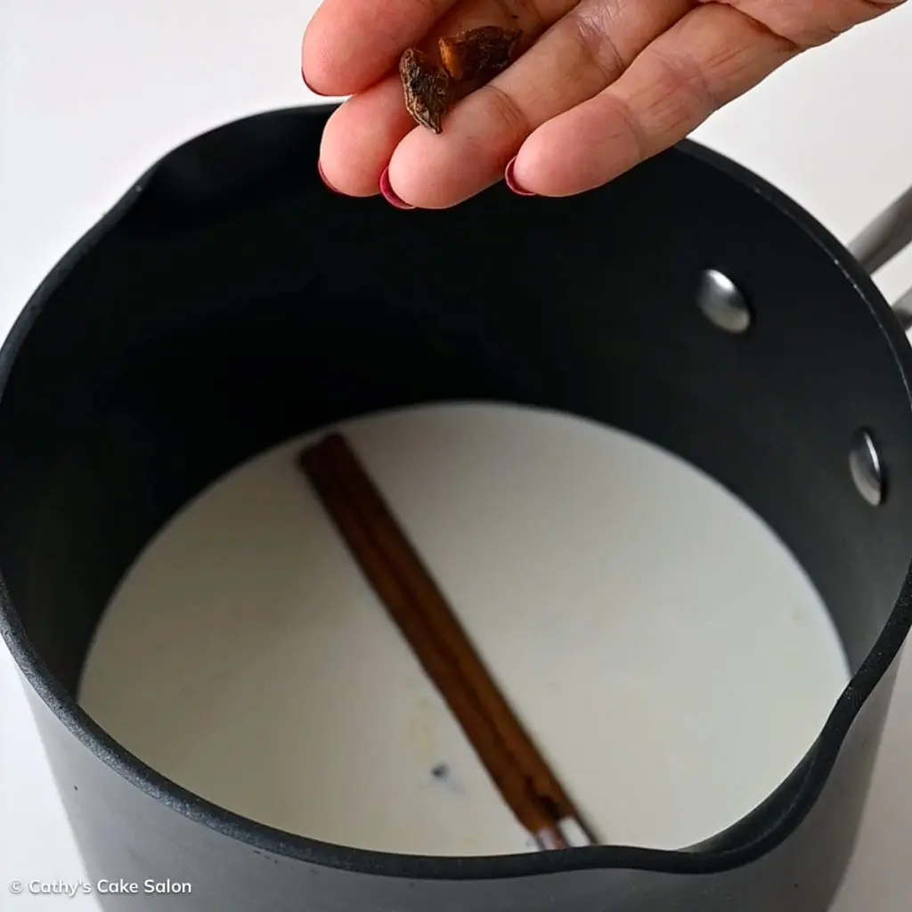 Process shot 2 to make this recipe: Add 1 cinnamon stick, 3 cardamom pods, a whole clove and 3 star anise petals.
