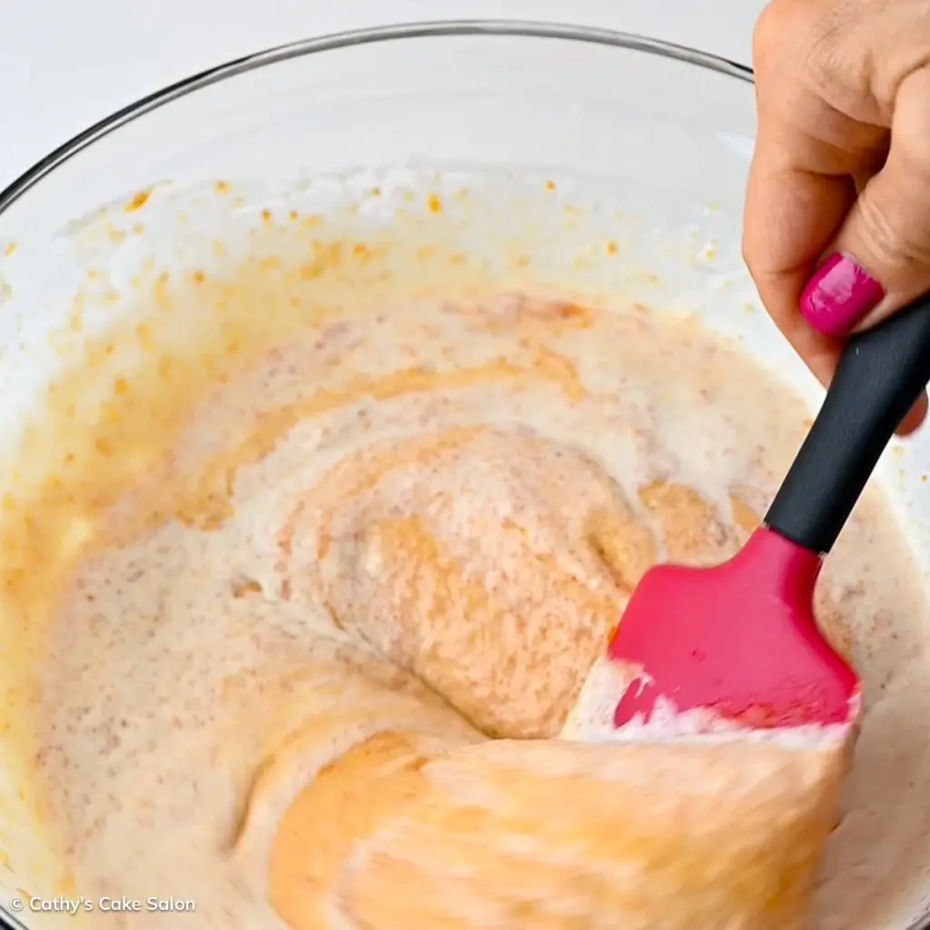 Process shot 6 to make this recipe: Pour persimmon puree into cream mixture and stir.