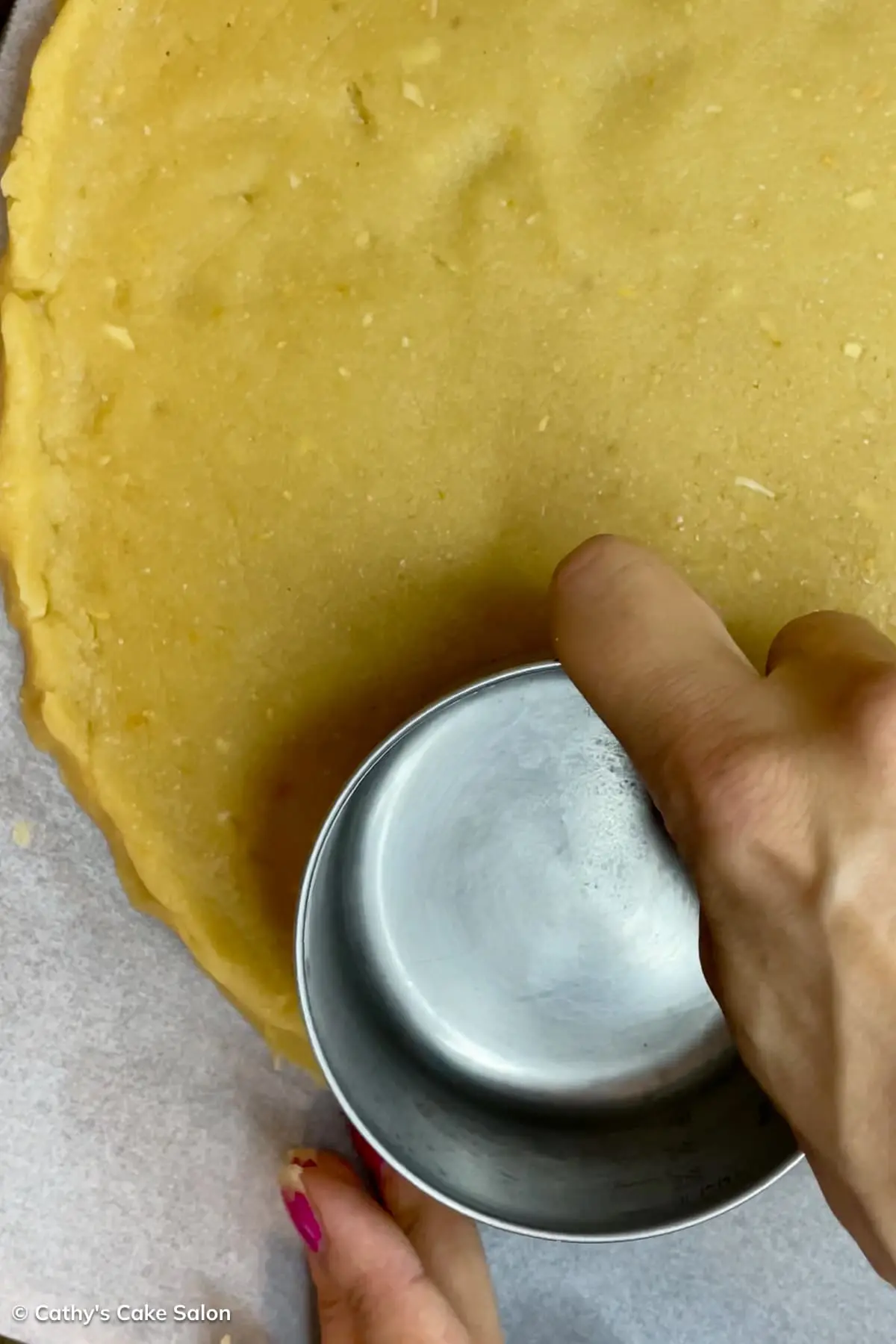 Step 6 to make this recipe: Use a mini saucepan to shape the sides.