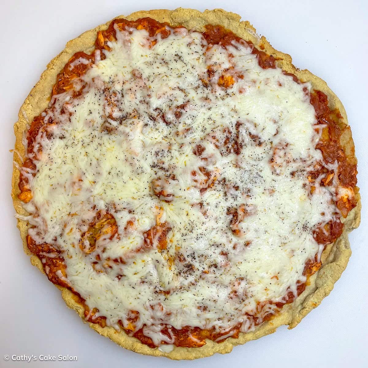 Pizza Margherita on an almond flour pizza crust.