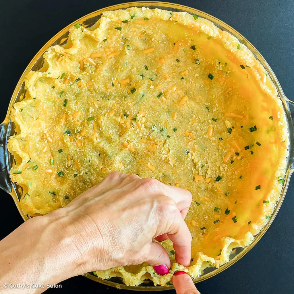 Step 4 in this recipe: Flute the sides of the keto savory pie crust.