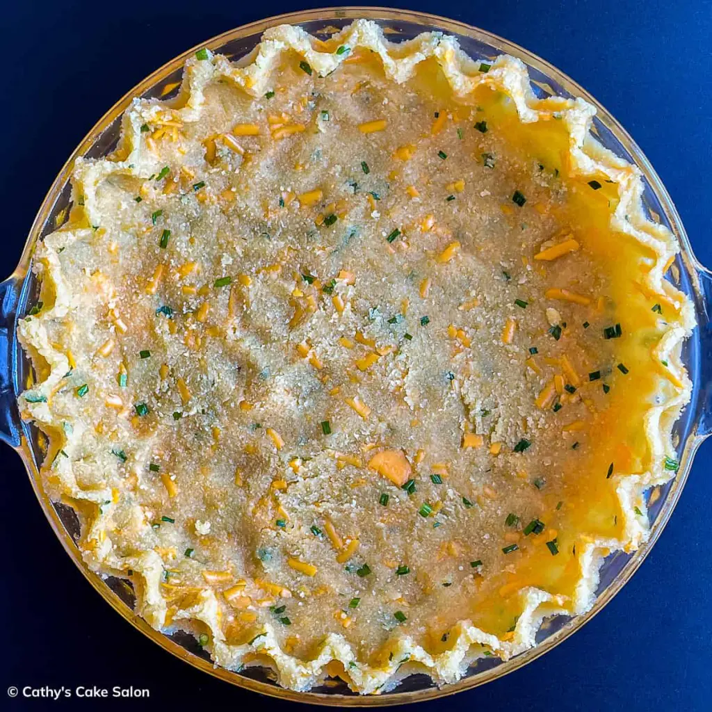 Step 5 in this recipe: The fluted cheddar pie crust.