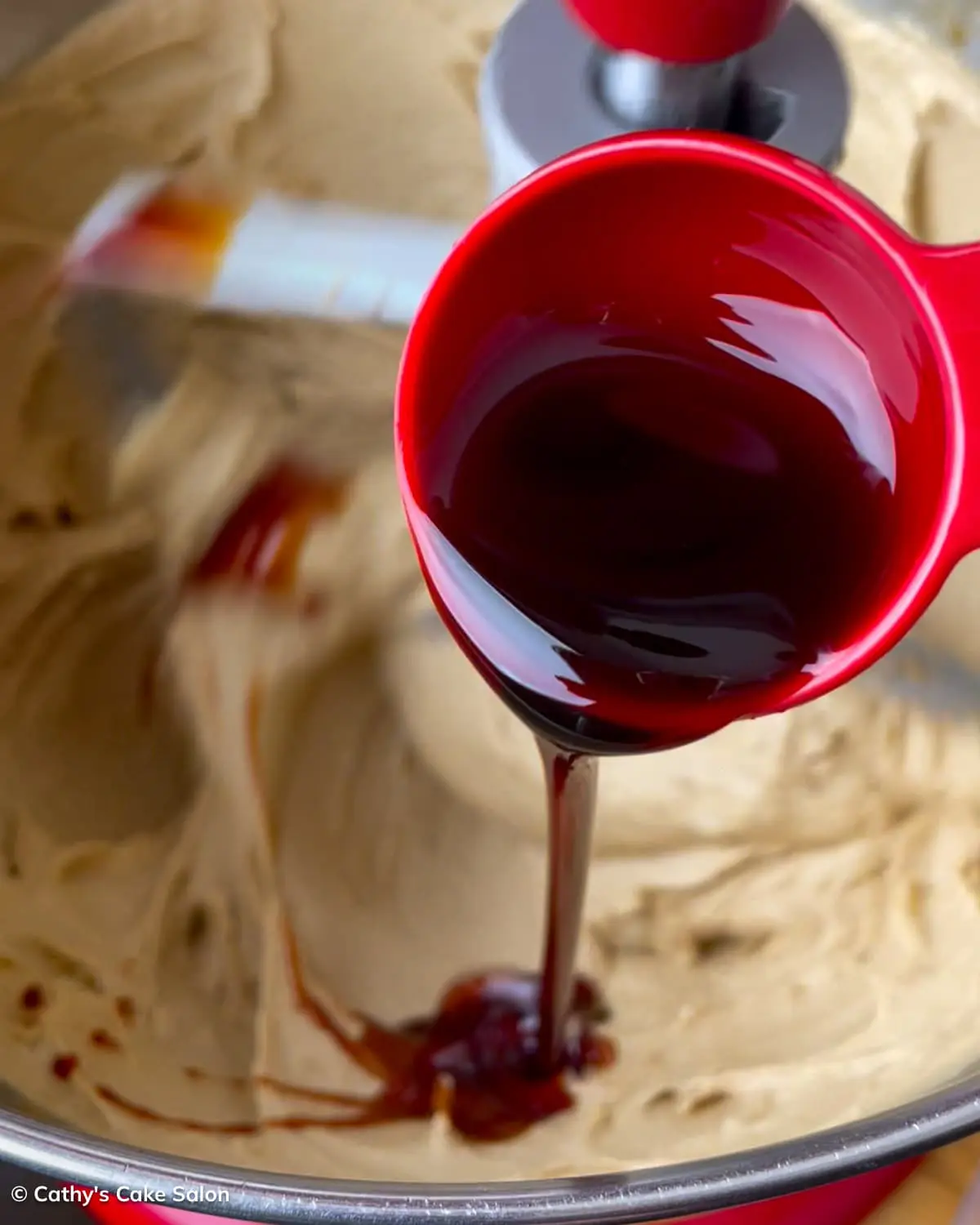 A step in the recipe: Add burnt sugar to the butter and eggs.