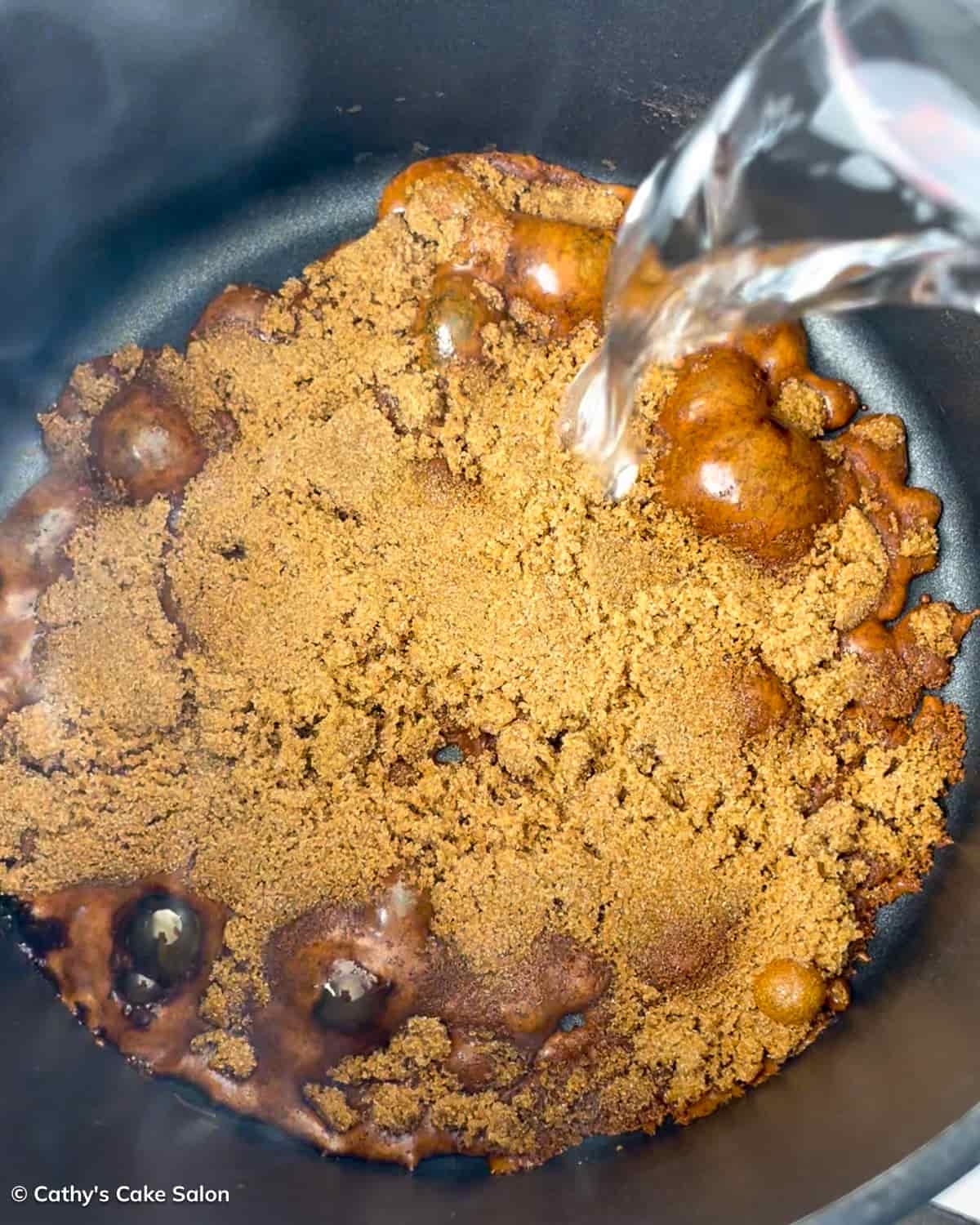 A step in the black cake recipe: Make the Caribbean burnt sugar.
