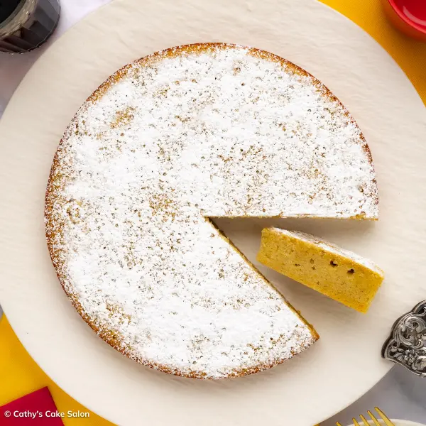 Guyanese sponge cake topped with powdered sugar.