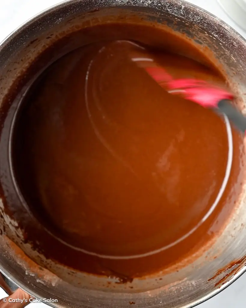 Step 5 to make the recipe: Stir the dark chocolate cake batter.