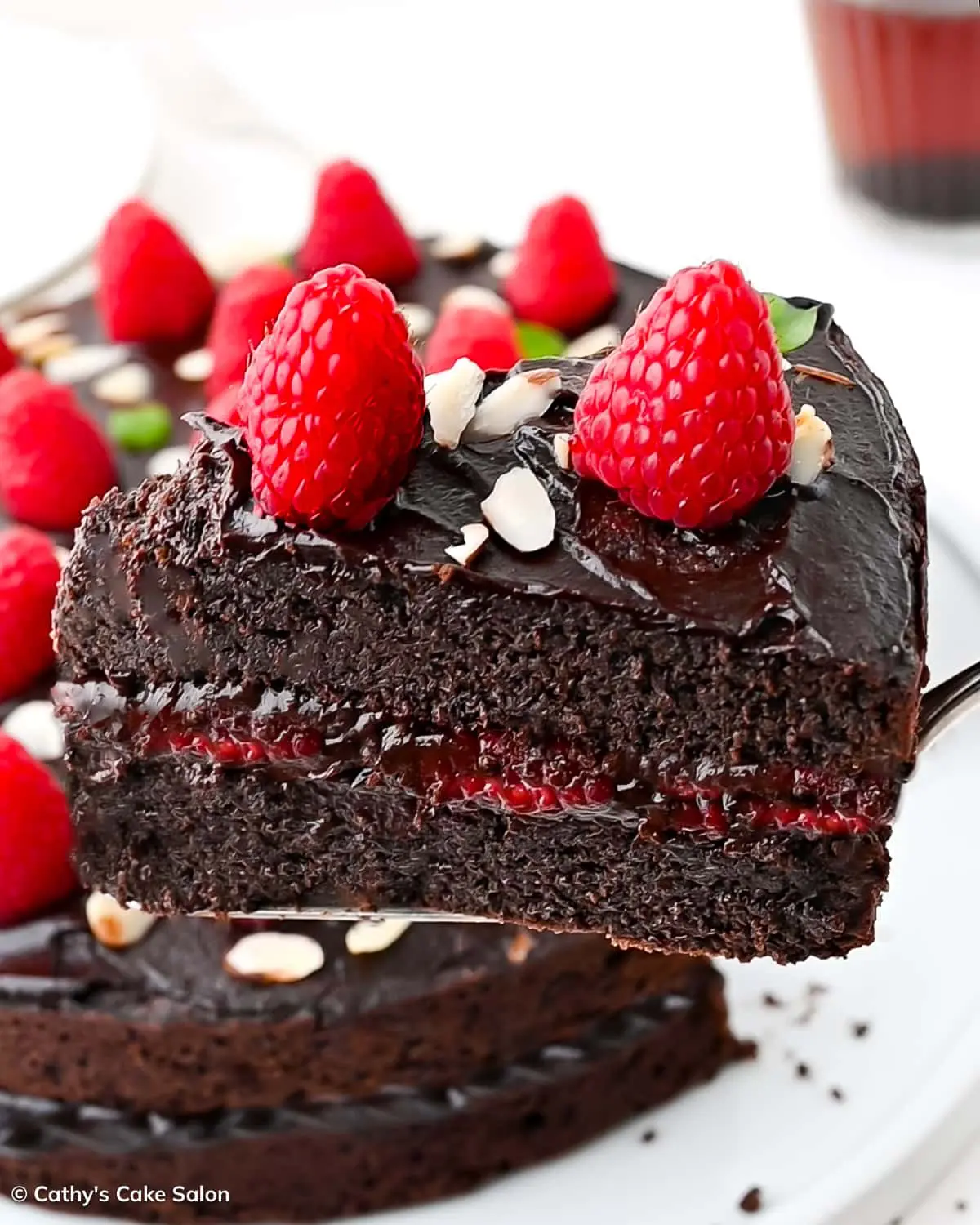 Moist and fudgy keto chocolate raspberry cake.
