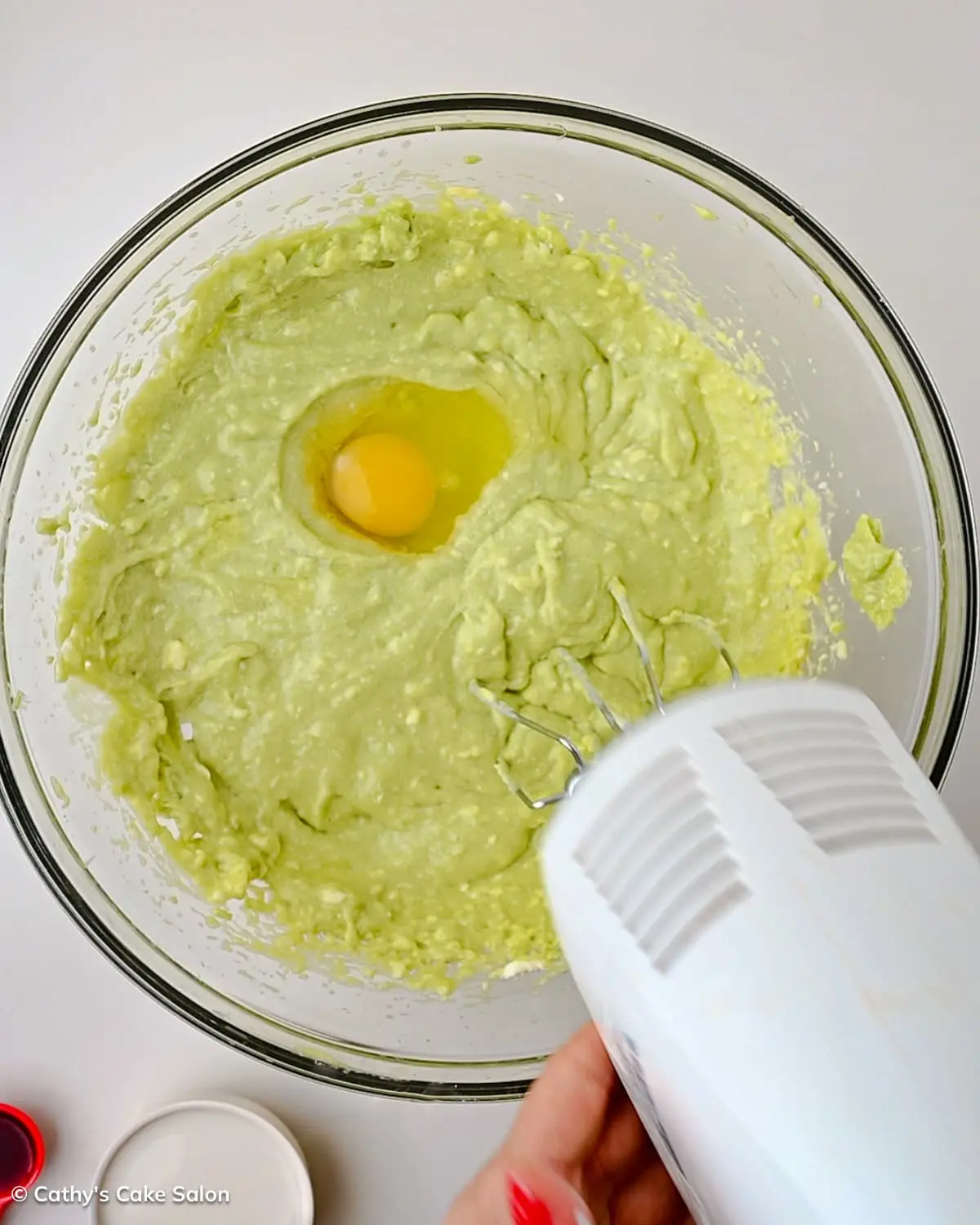 A step in the recipe: Beat the wet ingredients.