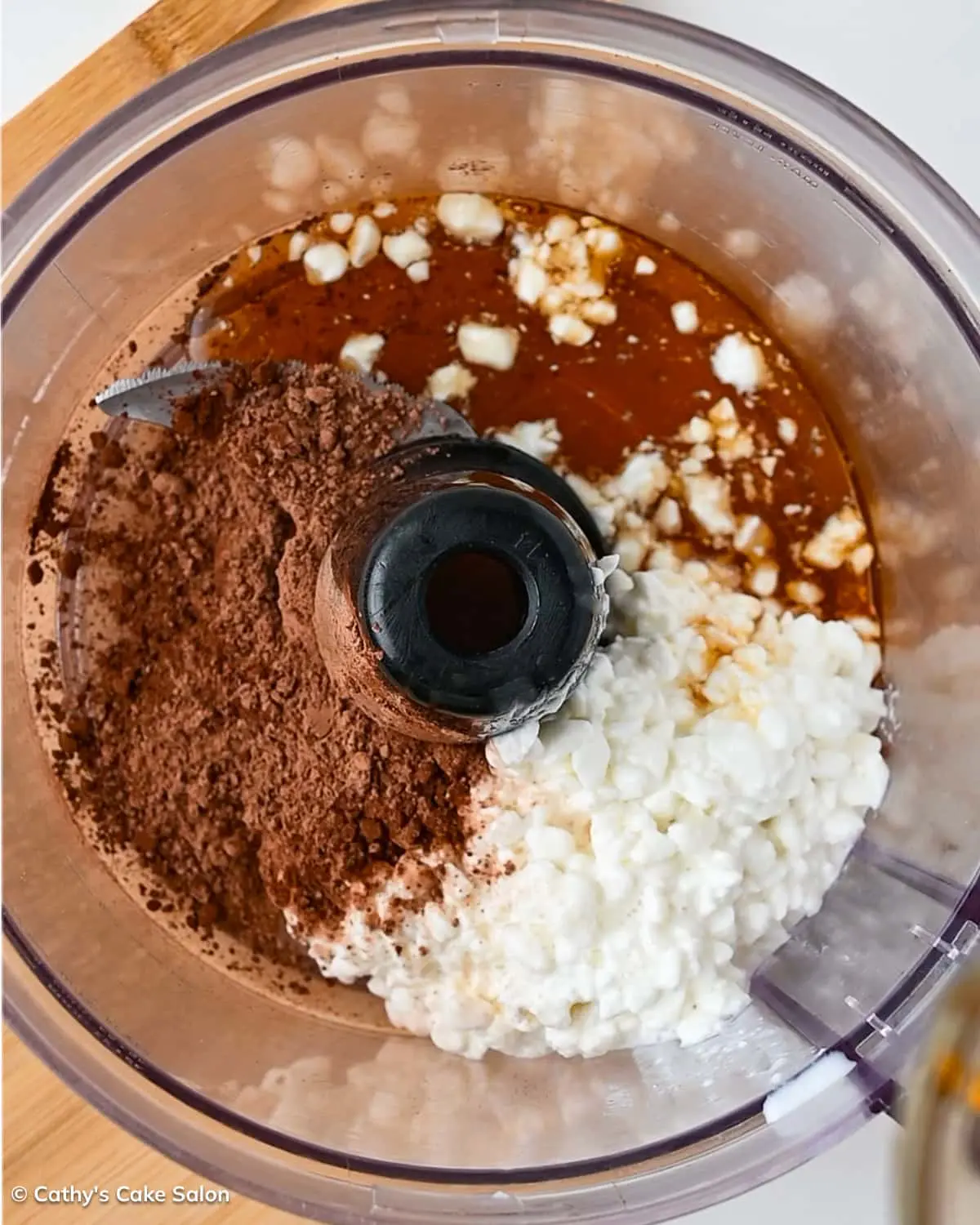 A step in the recipe: Put the healthy, low-carb ingredients in a blender or food processor and mix.