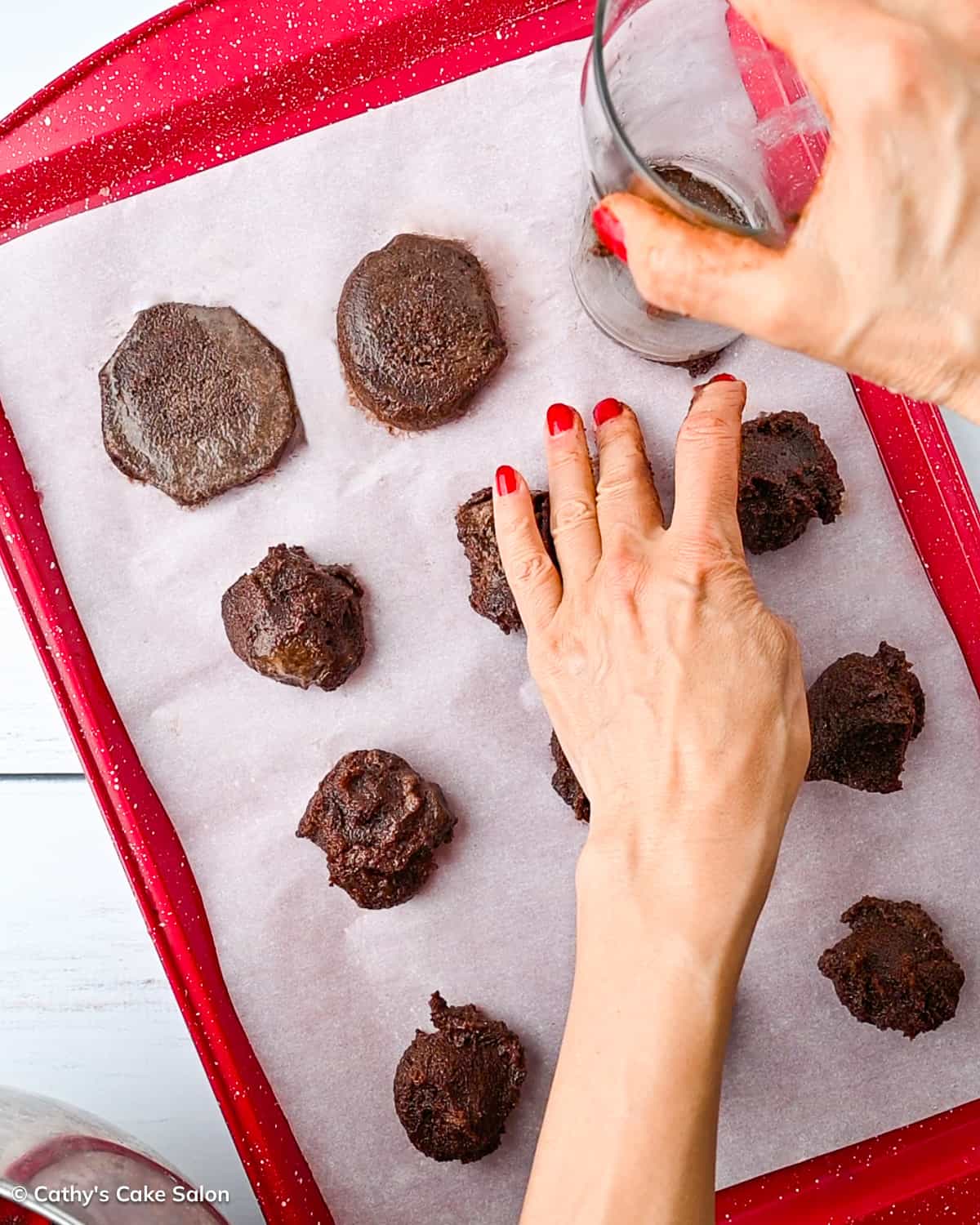 A step in the recipe: Scoop the keto cookies onto a cookie sheet.