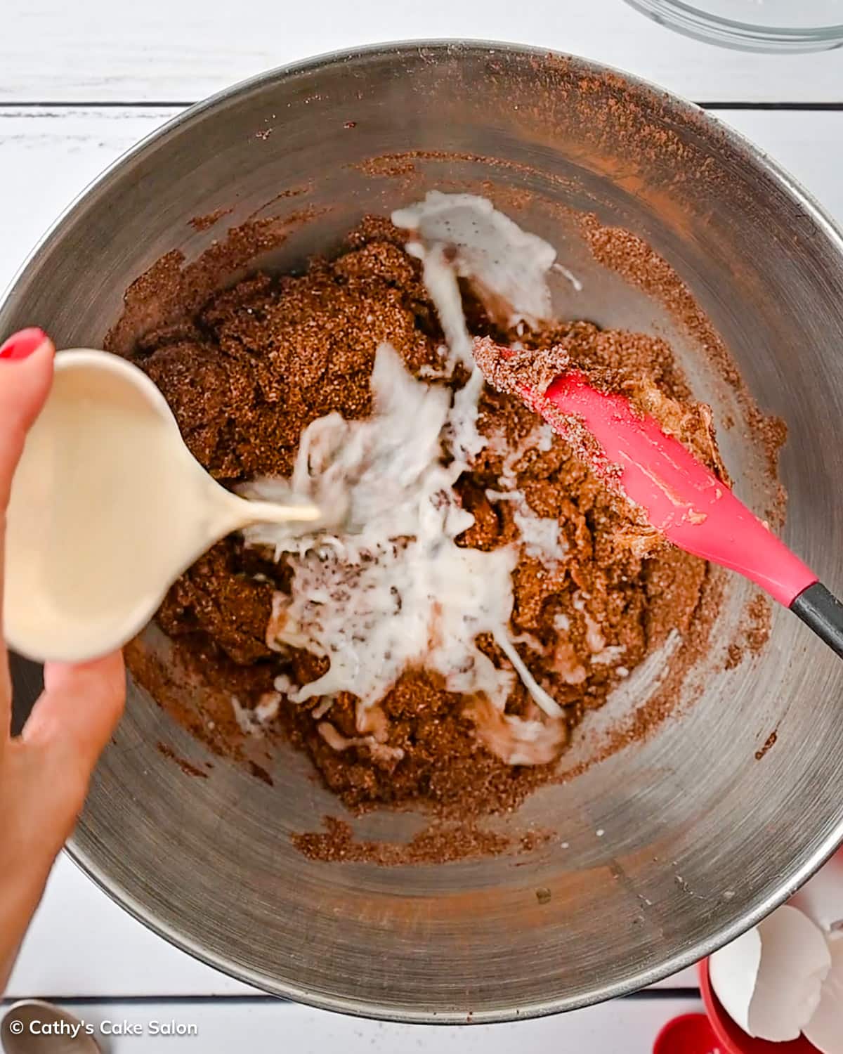 A step in the recipe: Add the unsweetened almond milk to the sugar free chocolate cookie dough.