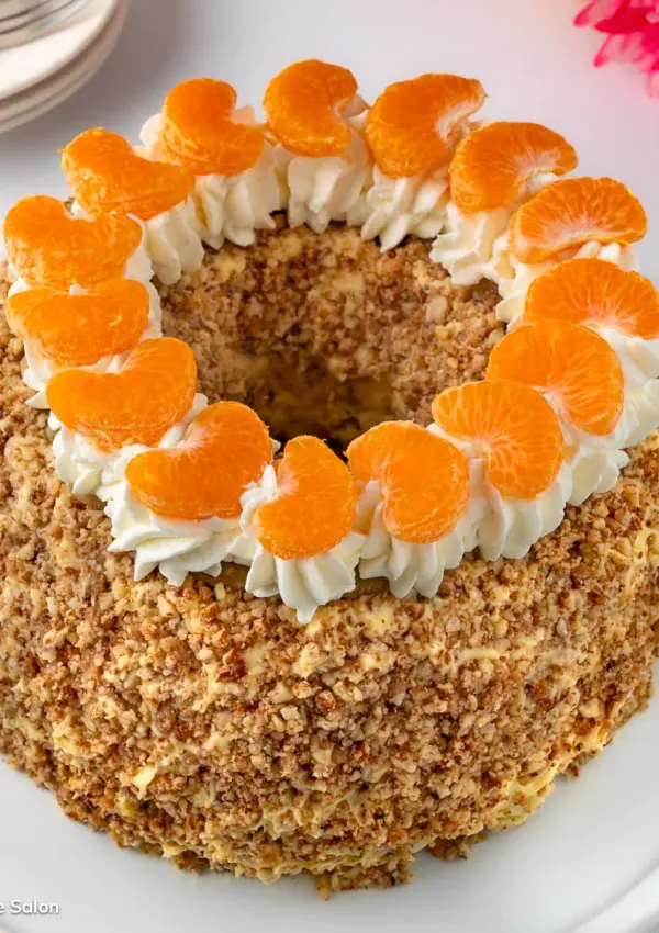 A cake topped with this Grand Marnier Whipped Cream Recipe.