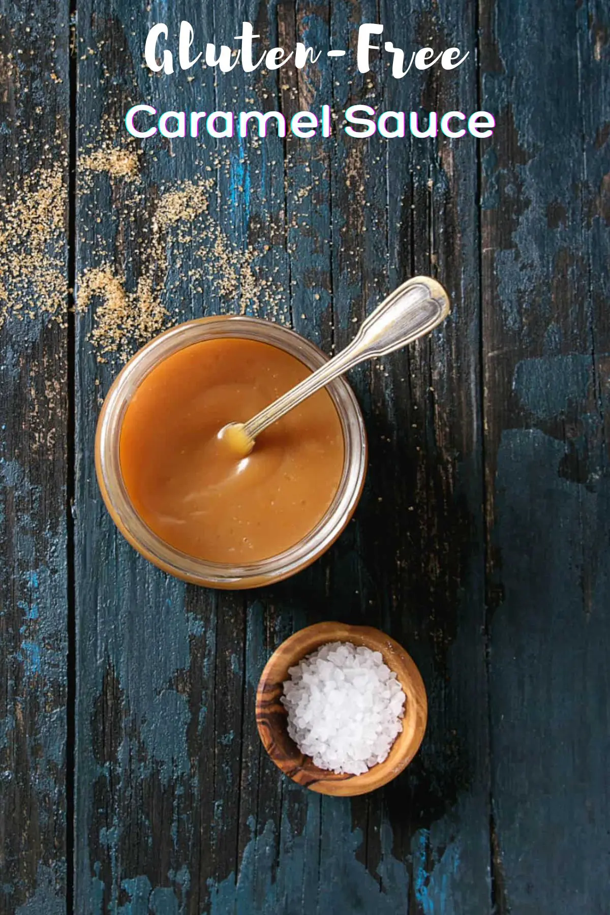 A bowl of gluten free, sugar free salted caramel sauce with a spoon in it.